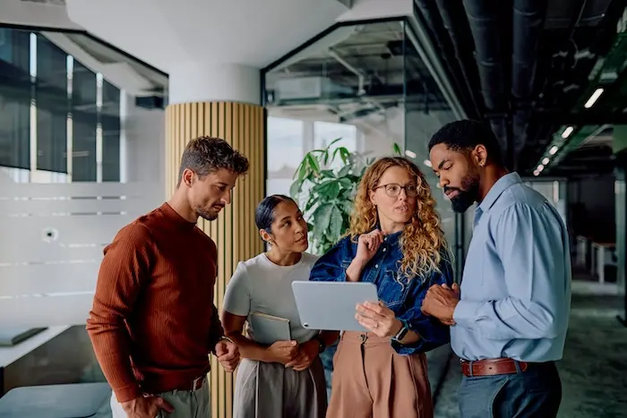 A group of employees in a neurodiverse tech workforce