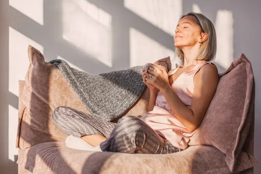 Young mother enjoying time to herself with a cup of coffee.